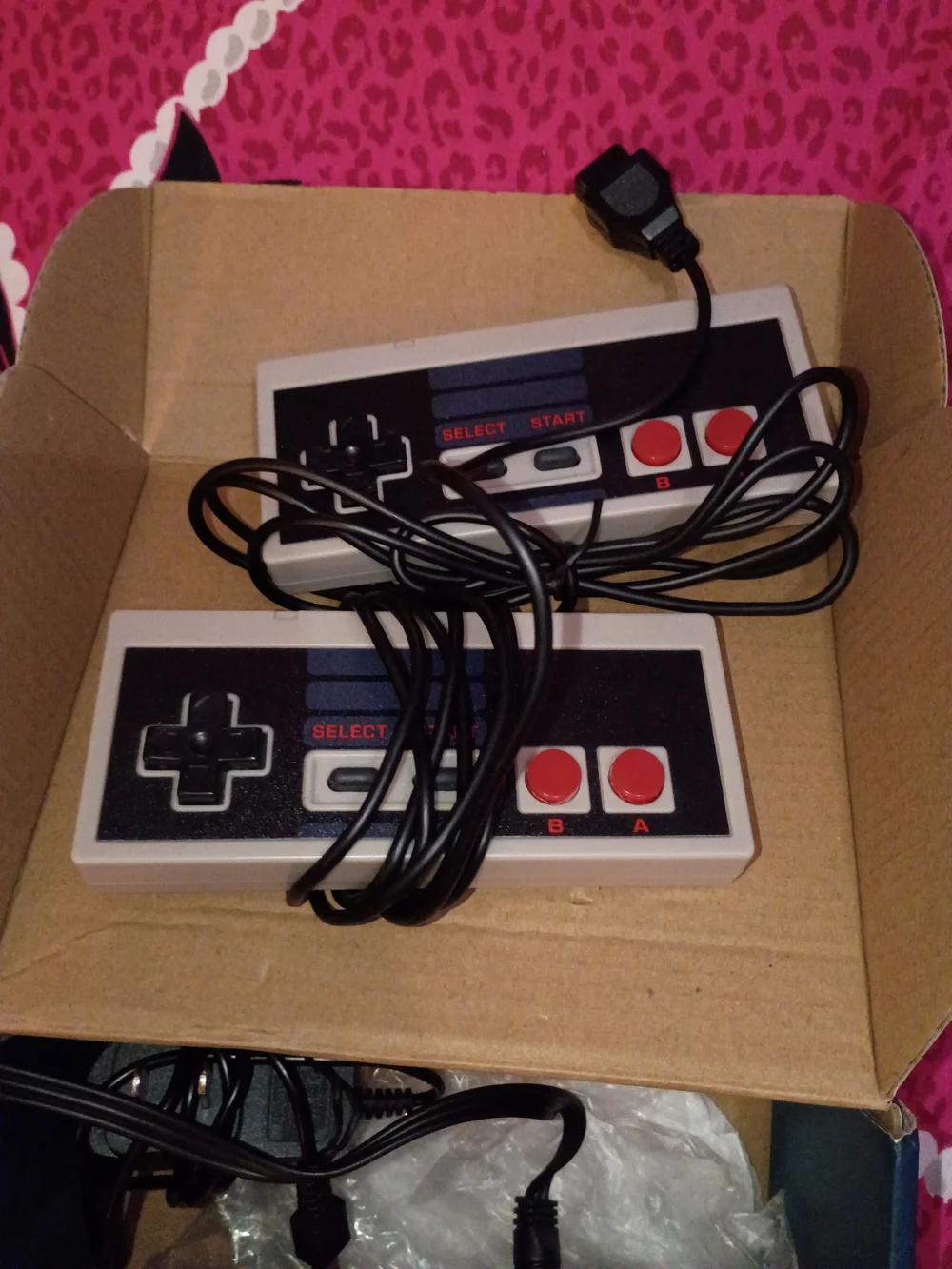Gray Entertainment System Console with Wired Controllers